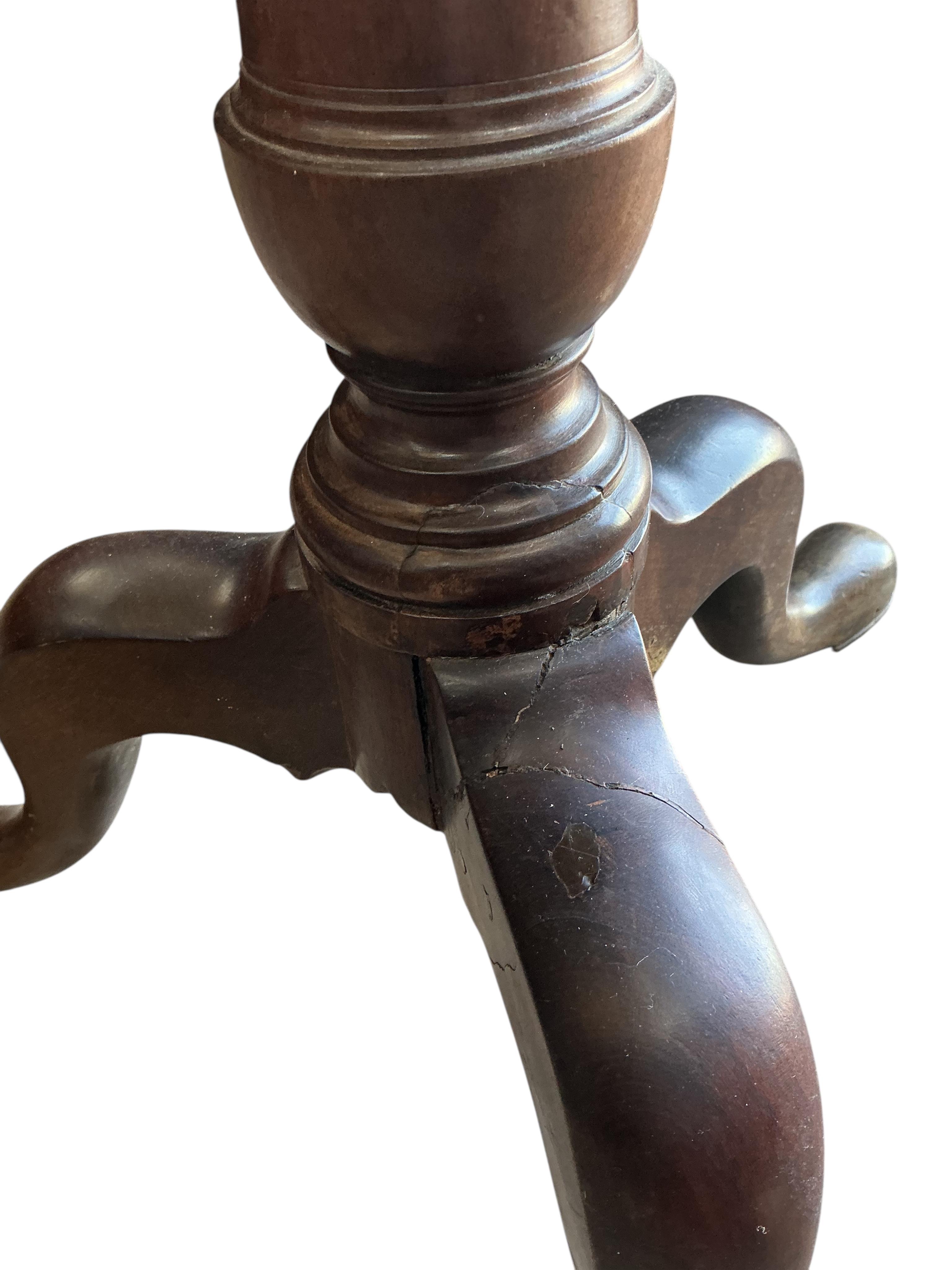 A George III circular mahogany tilt top tripod tea table, diameter 91cm, height 72cm